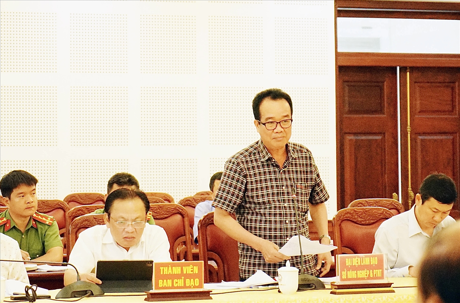 Giám đốc Sở Nông nghiệp và PTNT tỉnh Gia Lai Lưu Trung Nghĩa báo cáo kết quả triển khai thực hiện chương trình MTQG xây dựng nông thôn mới