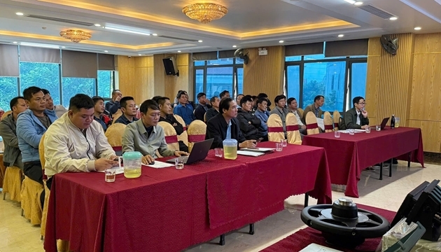 Quang cảnh lớp tập huấn về Nâng cao năng lực liên kết sản xuất và chống khai thác IUU trong nghề cá (Ảnh TTKNQG)