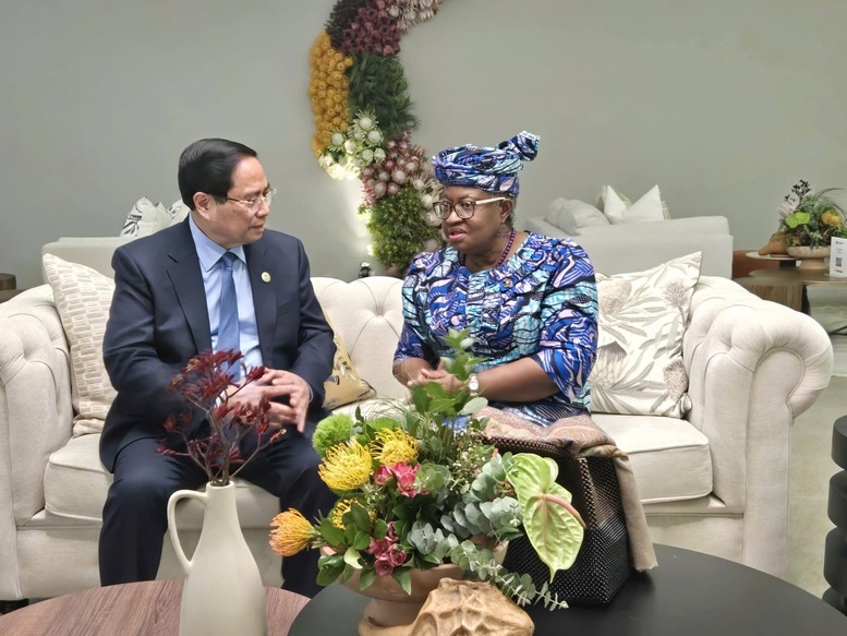 Thủ tướng Phạm Minh Chính và Tổng giám đốc WTO Ngozi Okonjo-Iweala - Ảnh: VGP/Nhật Bắc