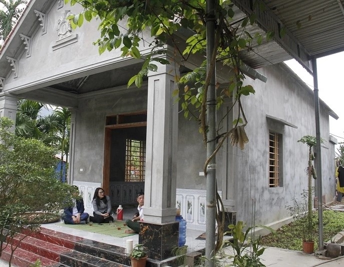 Ngôi nhà mới được xây dựng của gia đình anh Trương Văn Thoại ở Thôn Mé (ảnh Tiến Đông)