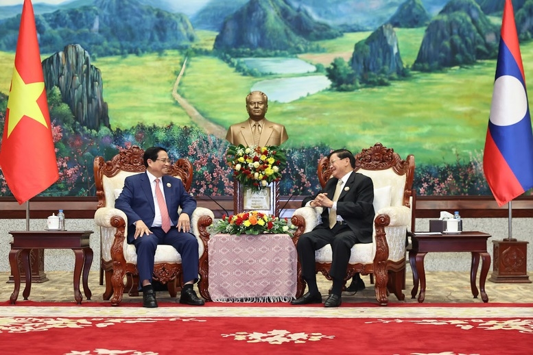 Thủ tướng Phạm Minh Chính nhiệt liệt chúc mừng những thành tựu to lớn, toàn diện mà Lào đạt được trong 50 năm xây dựng – phát triển đất nước và 40 năm đổi mới - Ảnh: VGP/Nhật Bắc