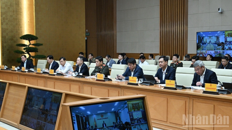 Lãnh đạo các bộ, ngành, cơ quan, đơn vị tham dự cuộc họp. (Ảnh: Trần Hải)