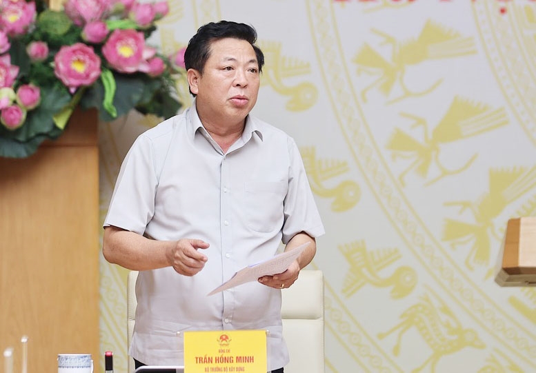 Bộ trưởng xây dựng Trần Hồng Minh phát biểu tại phiên họp - Ảnh: VGP/Nhật Bắc