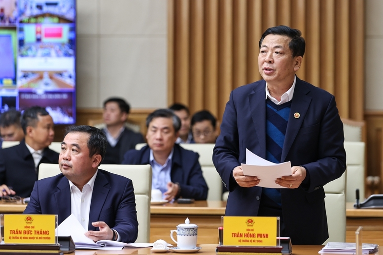 Bộ trưởng Bộ Xây dựng Trần Hồng Minh báo cáo tại phiên họp - Ảnh: VGP/Nhật Bắc