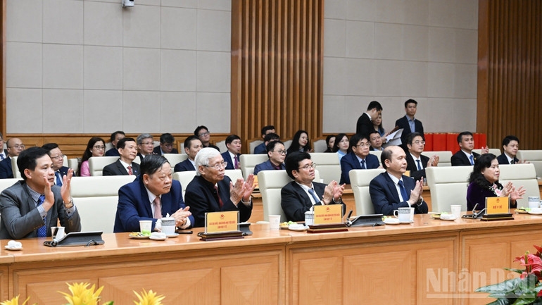 Các đại biểu tham dự cuộc gặp mặt. (Ảnh: TRẦN HẢI)