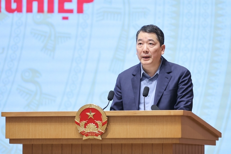 Thứ trưởng Bộ Tài chính Cao Anh Tuấn báo cáo tại Hội nghị - Ảnh VPG/Nhật Bắc